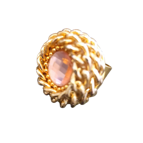 Anello rockabilly vortice di catena gold con cristallo swarovski centrale  di colore rosa, posizione laterale verso destra