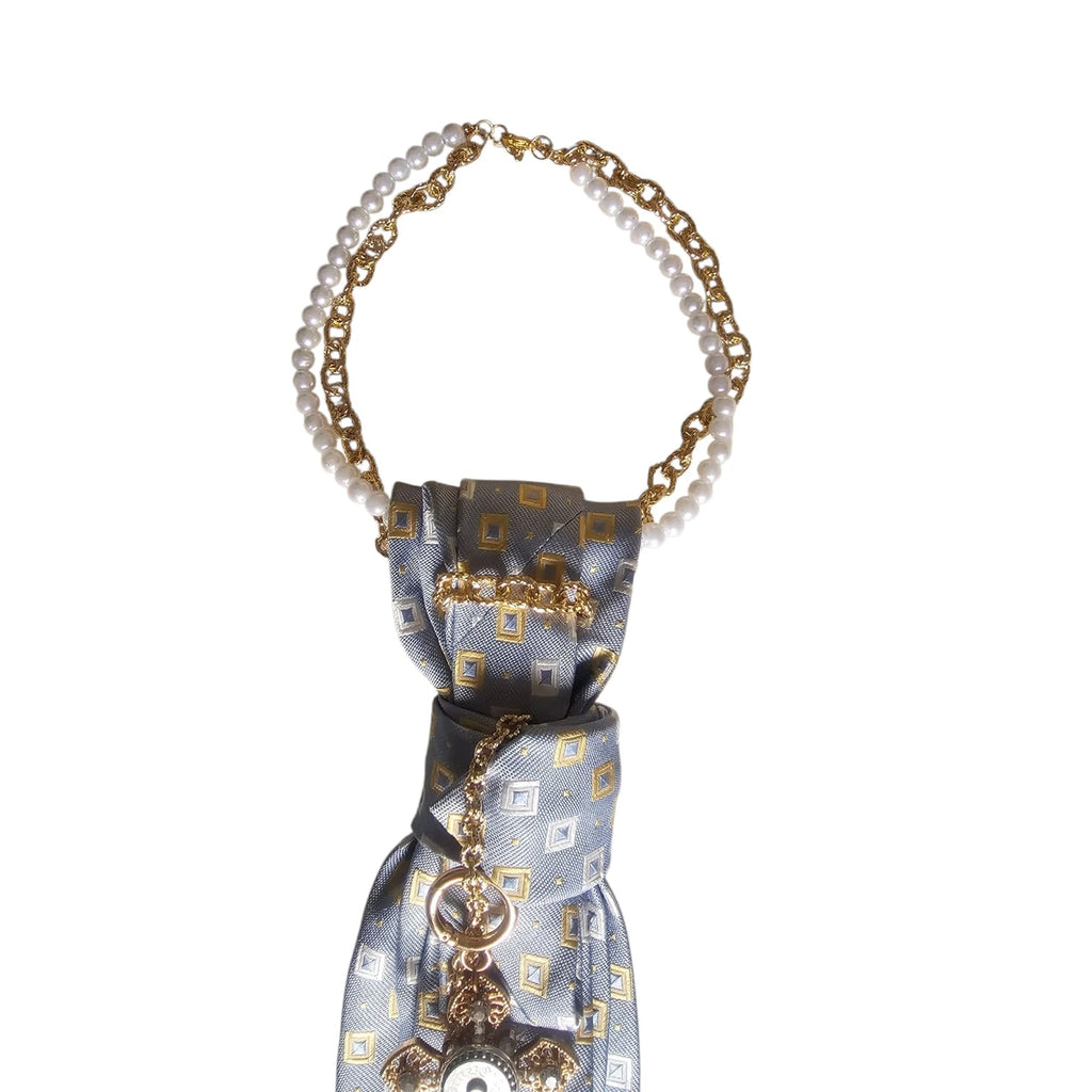 Dettaglio nodo collana cravatta gioiello blue and gold cross by claudia de rosa jewelry