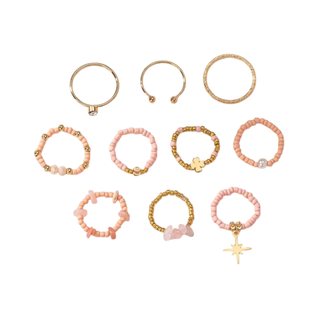 10 anelli componibili realizzati con perline di colore rosa cipria