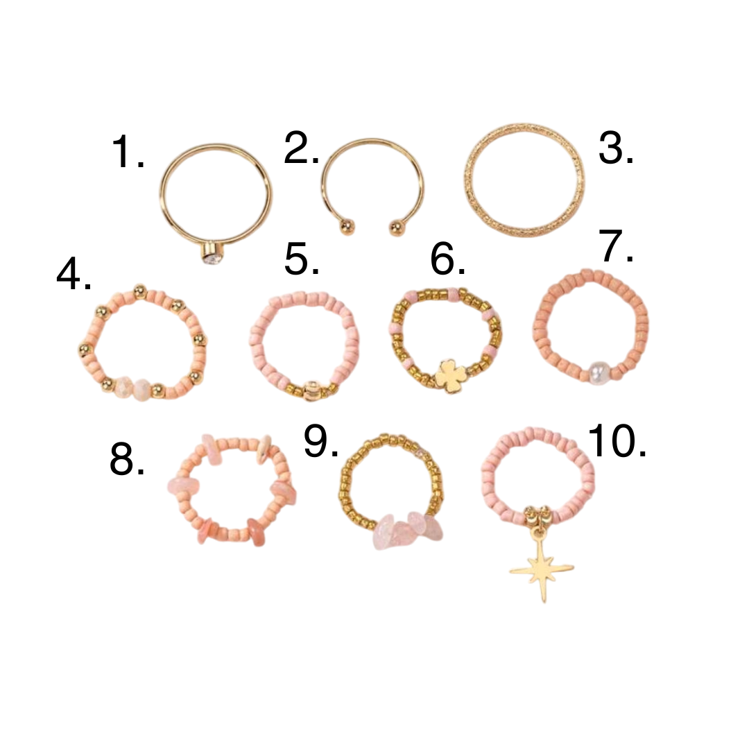 anelli realizzati artigianalmente con perline rosa cipria numerati per aggiunta nel carrello